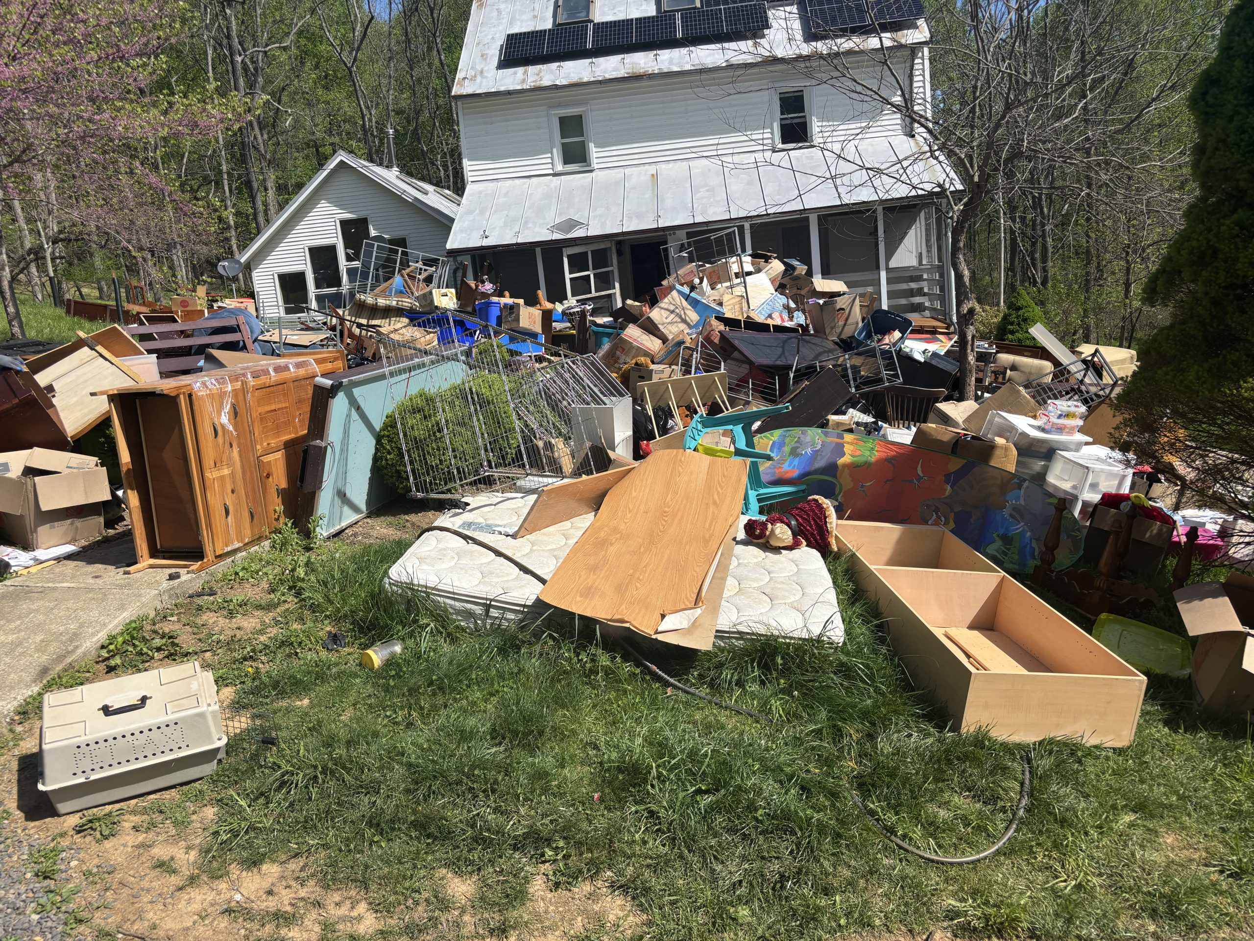 Junk hauling and cleanout services in Rockville, MD Residential junk cleanout pile ready for professional hauling in Rockville, MD