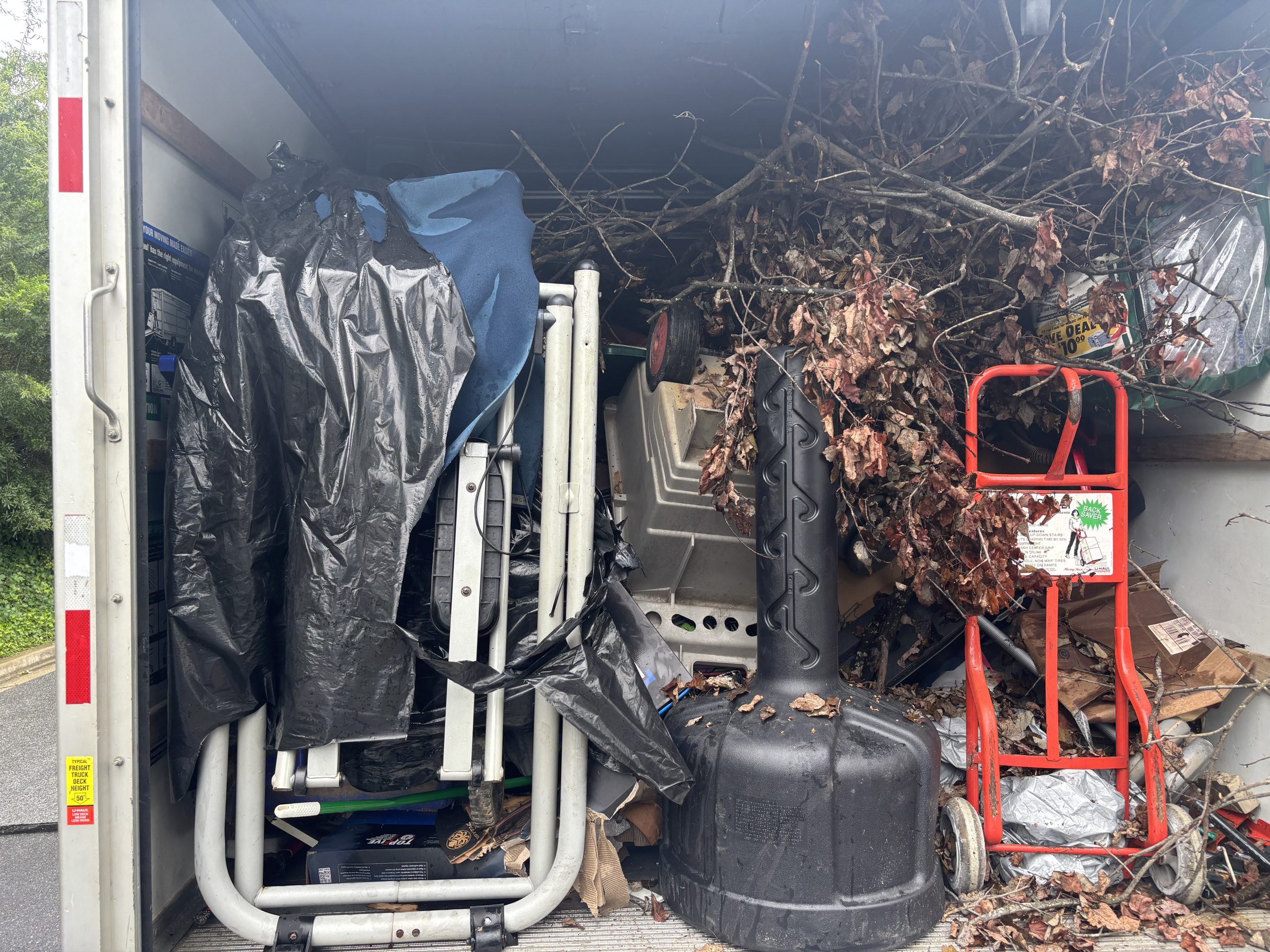 Household debris and trash bags ready for junk pickup near Rockville, MD Household debris and trash bags ready for junk pickup near Rockville, MD